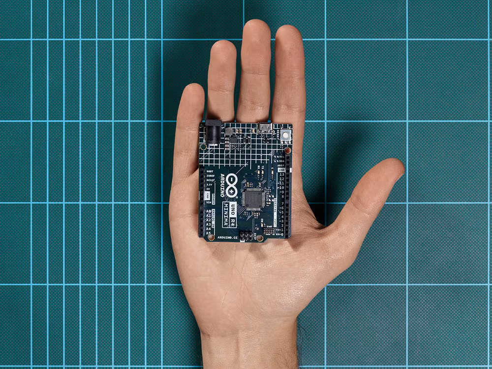 An UNO R4 Minima in the hand